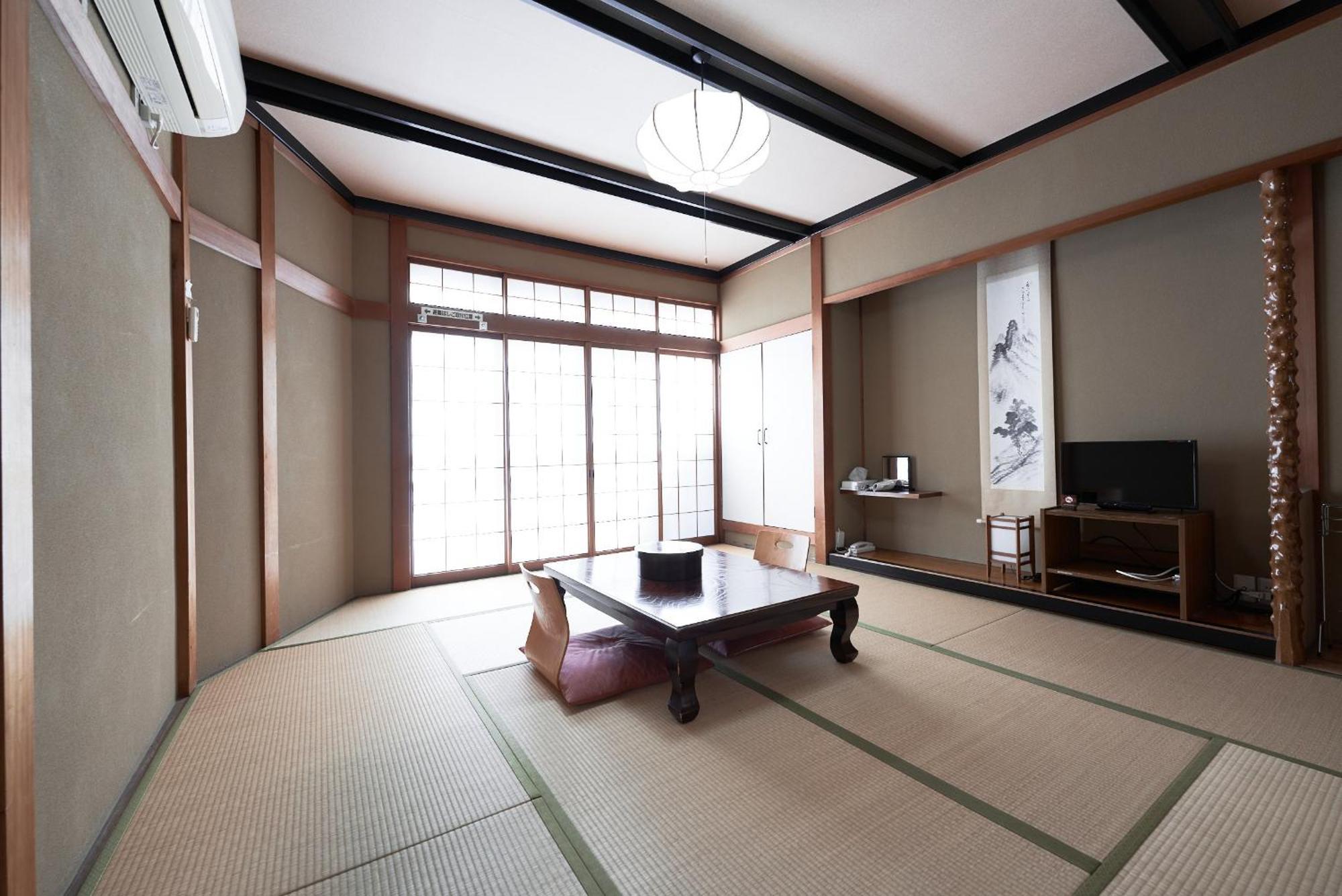 Ryokan Yamamuro Канадзава Номер фото